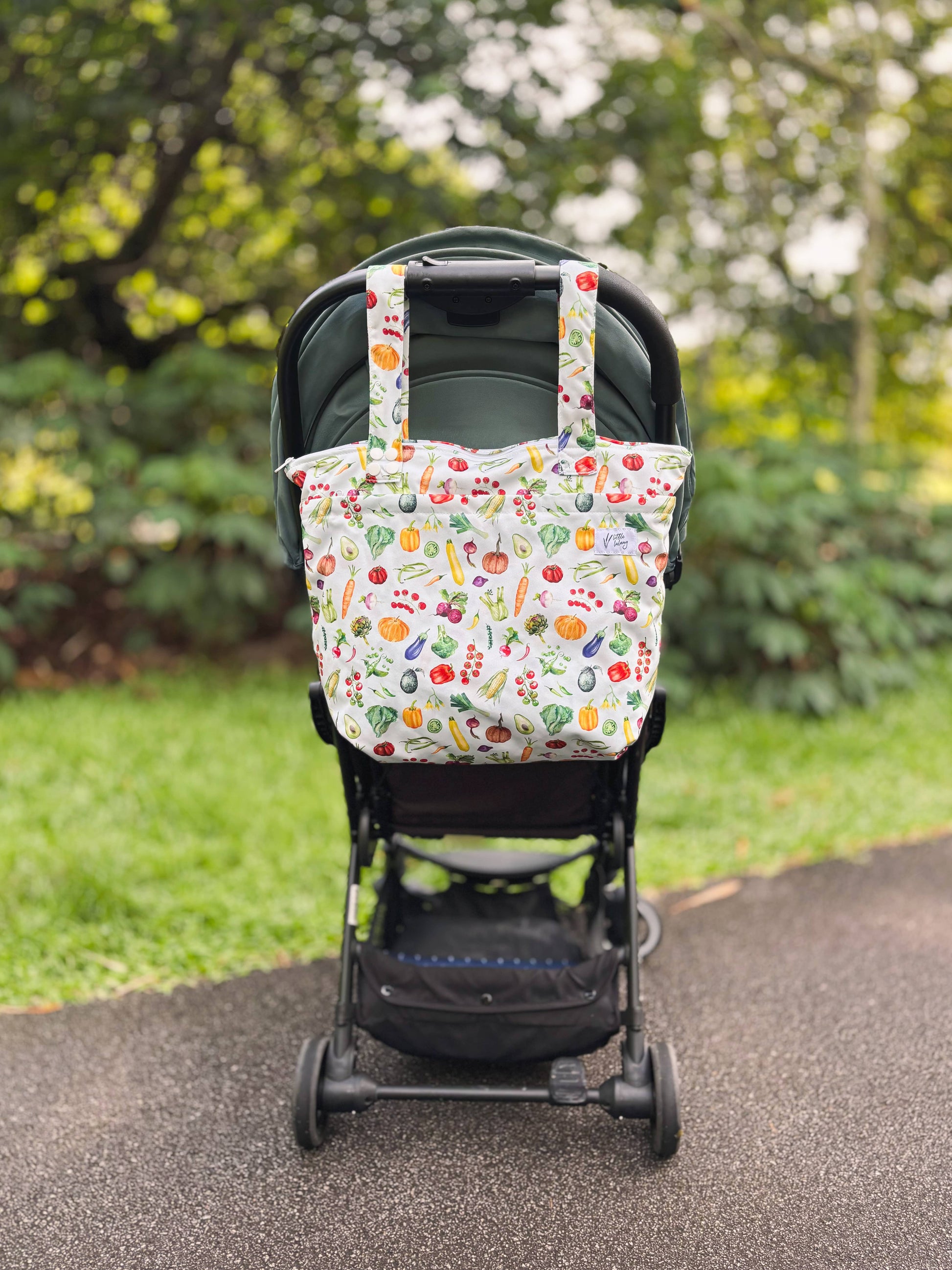 diaper bag hanging from stroller
