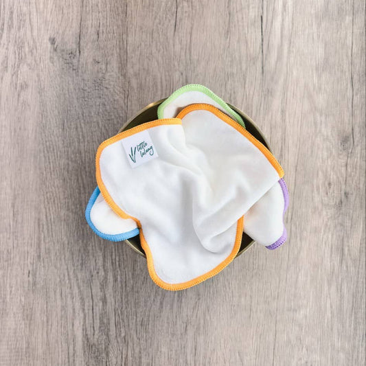 Set of baby wipes on a wooden surface