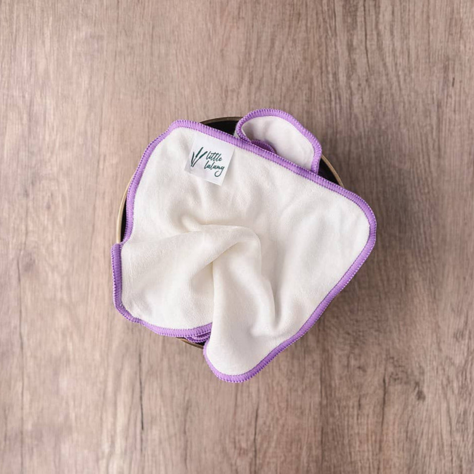 White cloth wipes with purple border